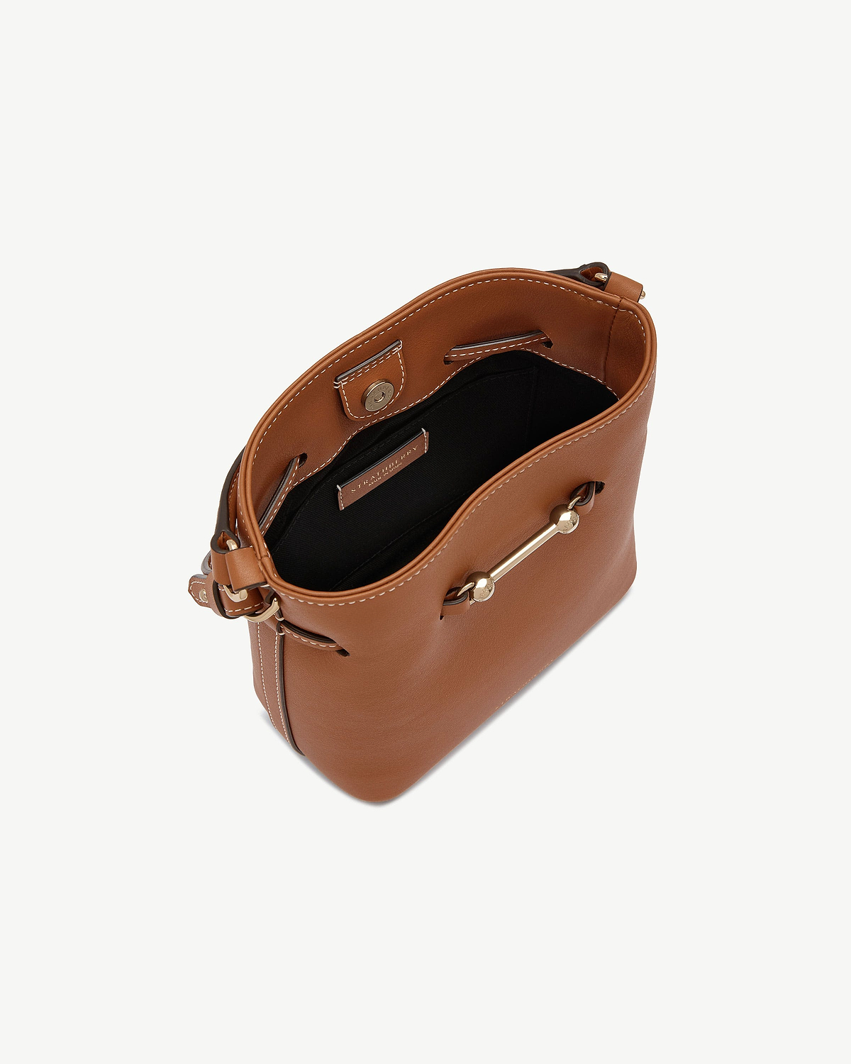 Chestnut Strathberry Corda Bucket Mini with open interior and gold hardware.