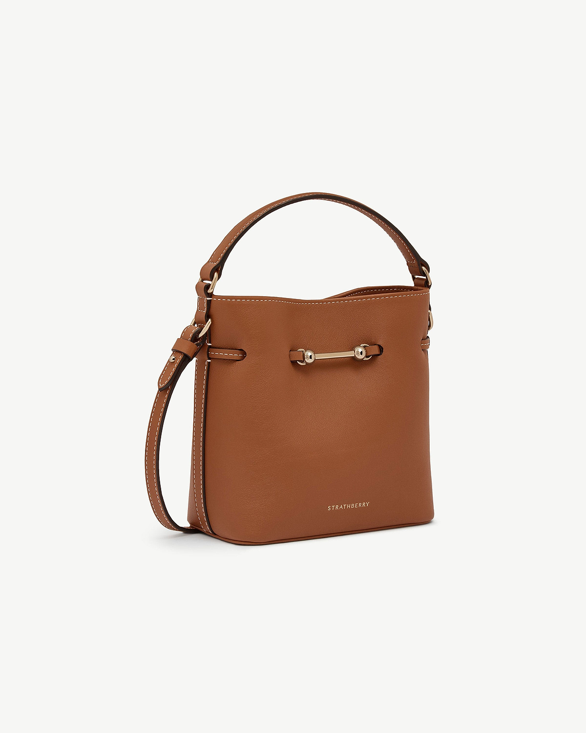Chestnut Strathberry Corda Bucket Mini leather bag with top handle, strap, and gold hardware.