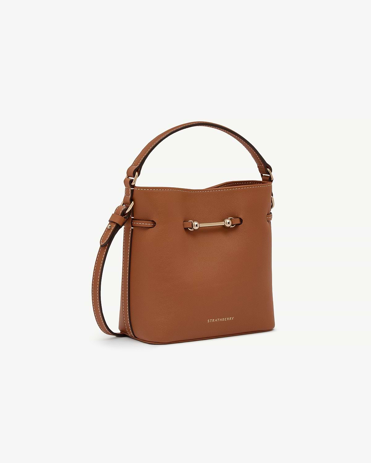 Chestnut Strathberry Corda Bucket Mini leather bag with top handle, strap, and gold hardware.