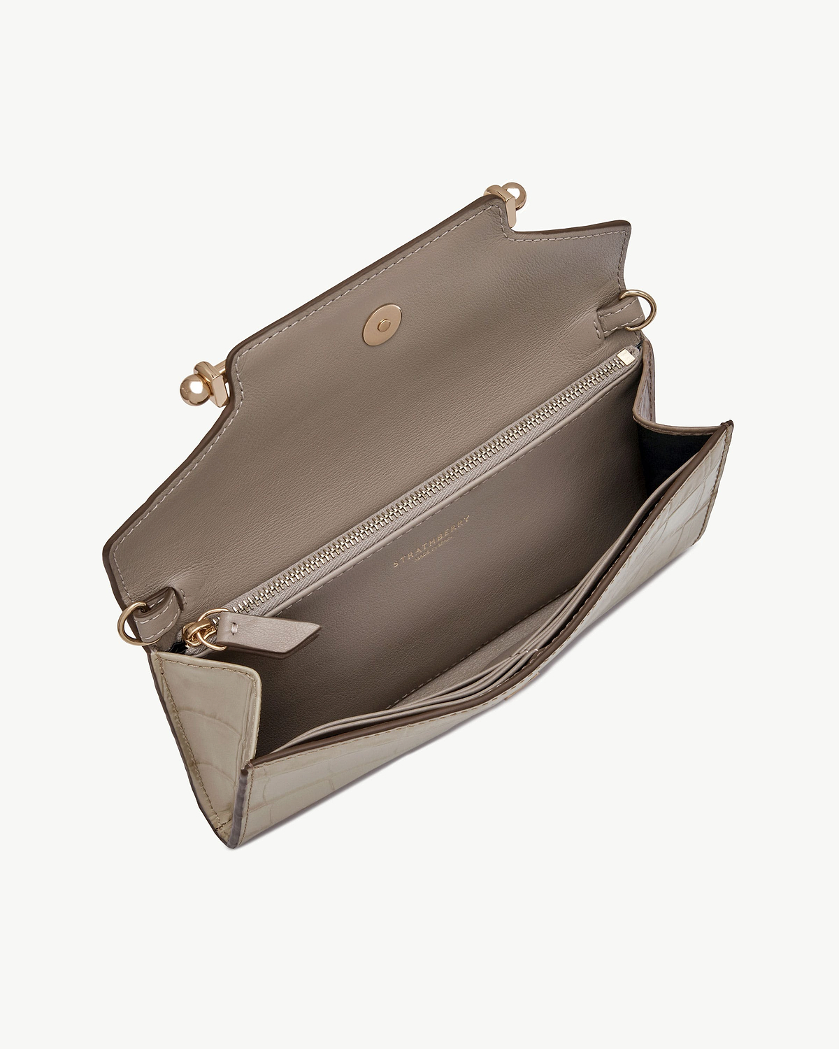 Strathberry croc chain wallet open, showing interior zip pocket and card slots