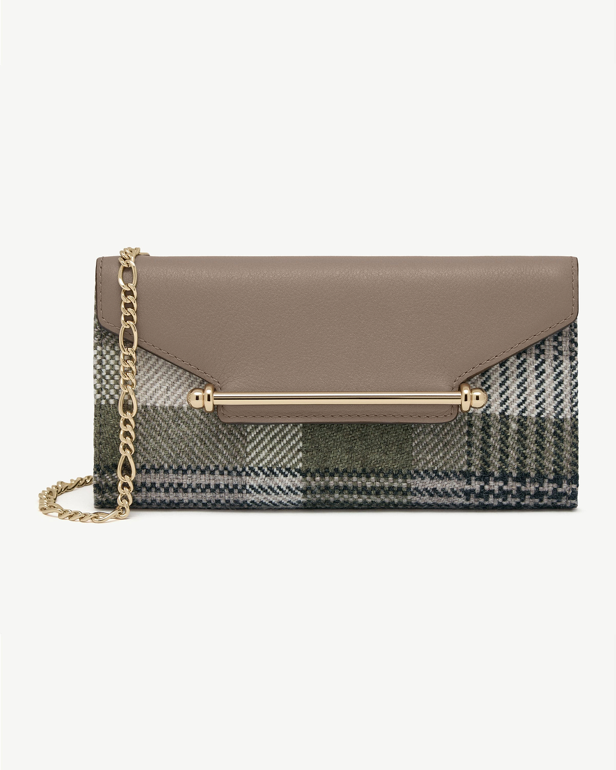 Taupe leather flap with gold bar and chain on tartan check wallet.