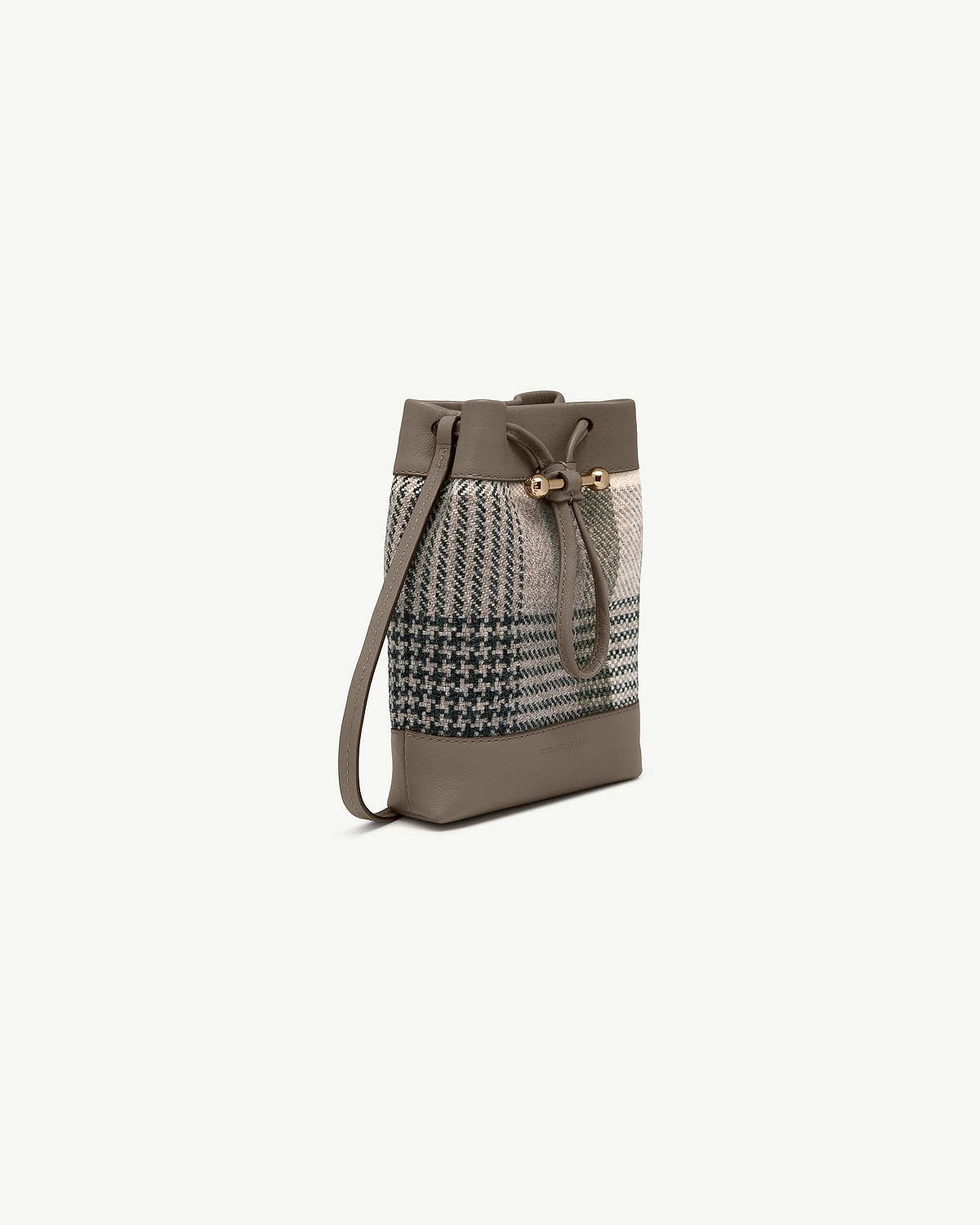 Strathberry Osette midi pouch in tartan taupe with drawstring and leather base