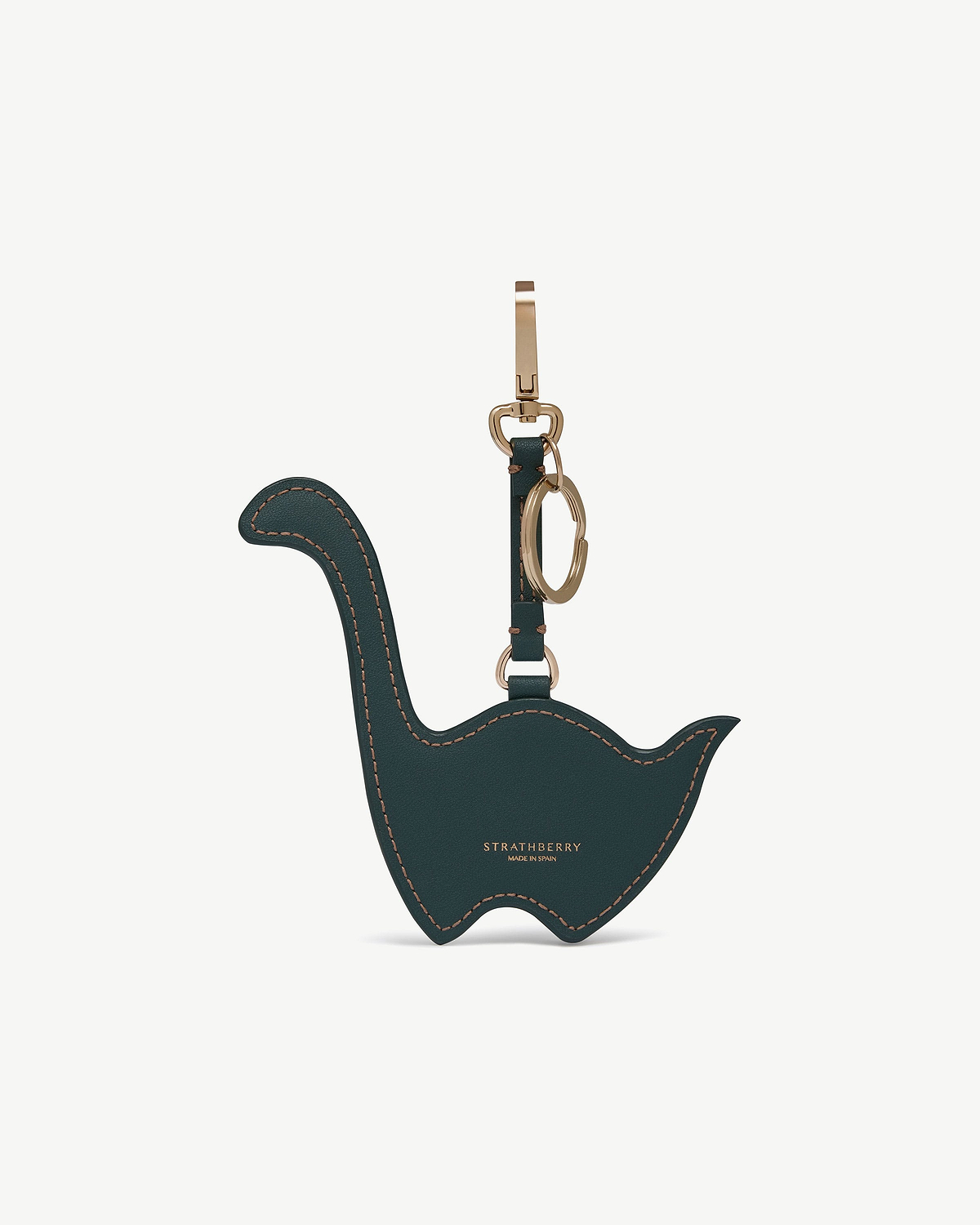Bottle green Nessie-shaped leather bag charm with gold hardware and Strathberry logo.