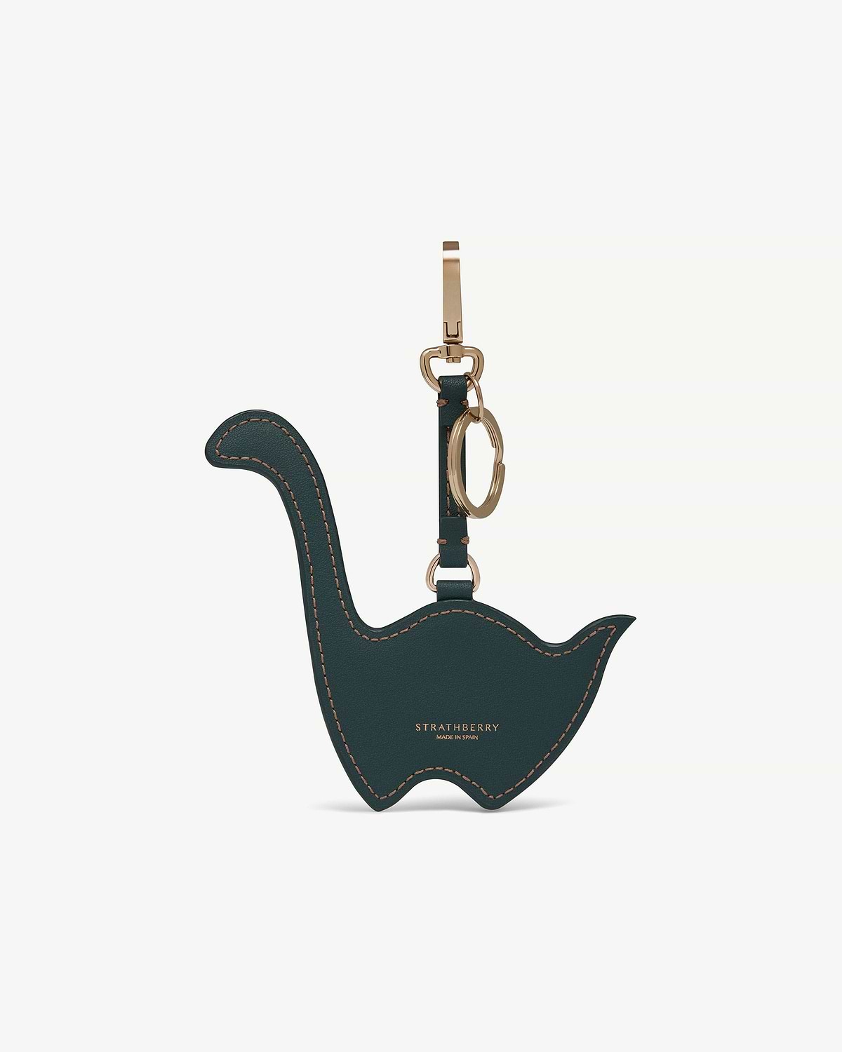 Bottle green Nessie-shaped leather bag charm with gold hardware and Strathberry logo.