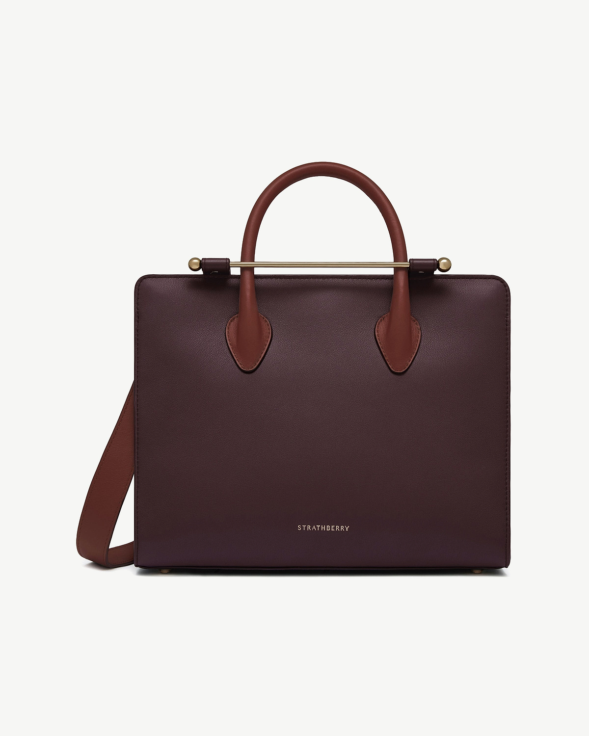 Burgundy, walnut and chestnut midi tote with top handles, shoulder strap and Strathberry logo.