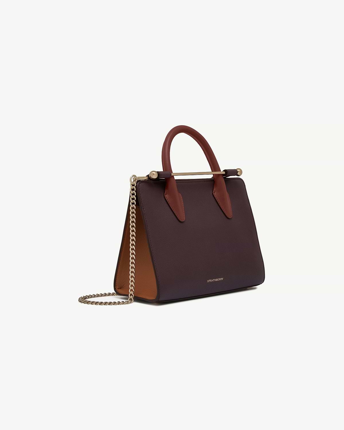 Strathberry mini tote in burgundy, chestnut and walnut with gold chain strap.
