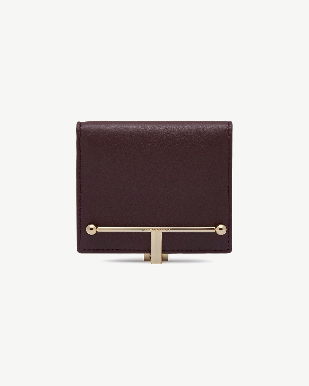 Burgundy leather Melville Street wallet front with gold T-bar hardware.