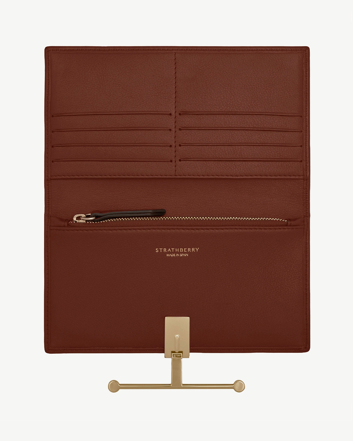 Strathberry walnut leather wallet interior with multiple card slots, zip pocket and gold hardware.