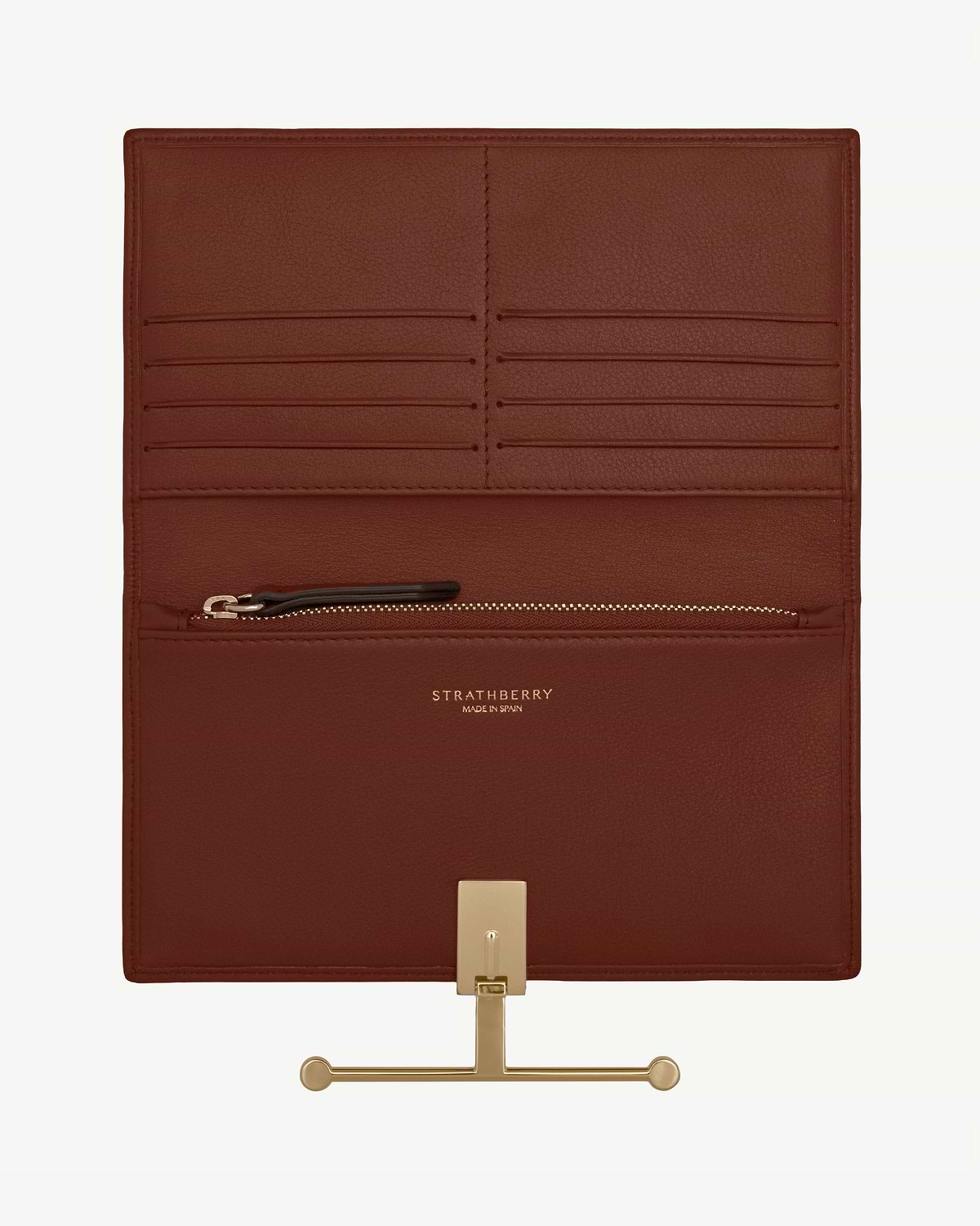 Strathberry walnut leather wallet interior with multiple card slots, zip pocket and gold hardware.