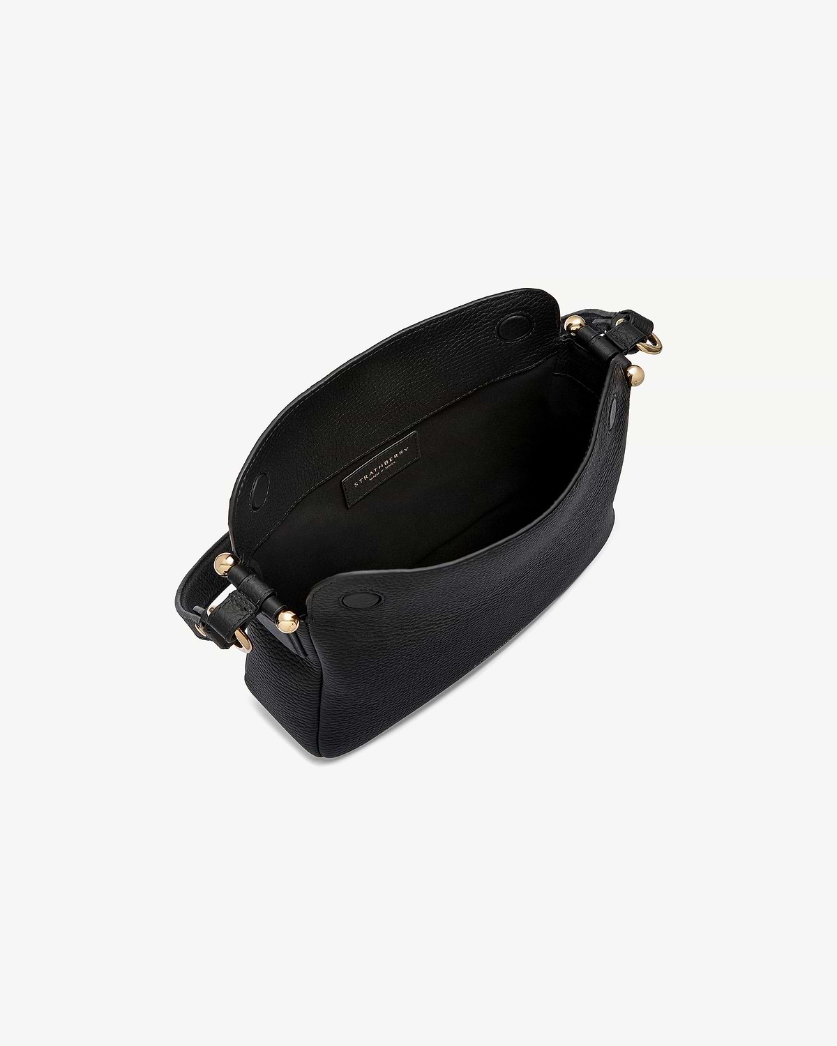 Strathberry Sway black leather bag shown open with gold hardware and strap.