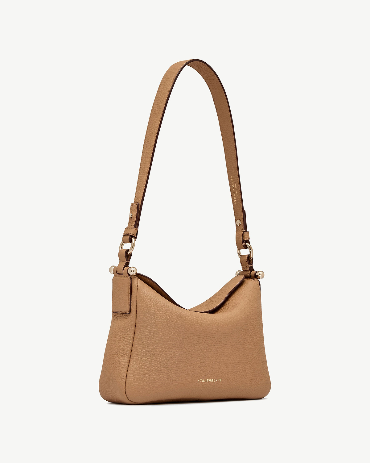 Caramel Sway leather shoulder bag with single strap, gold hardware, Strathberry logo.
