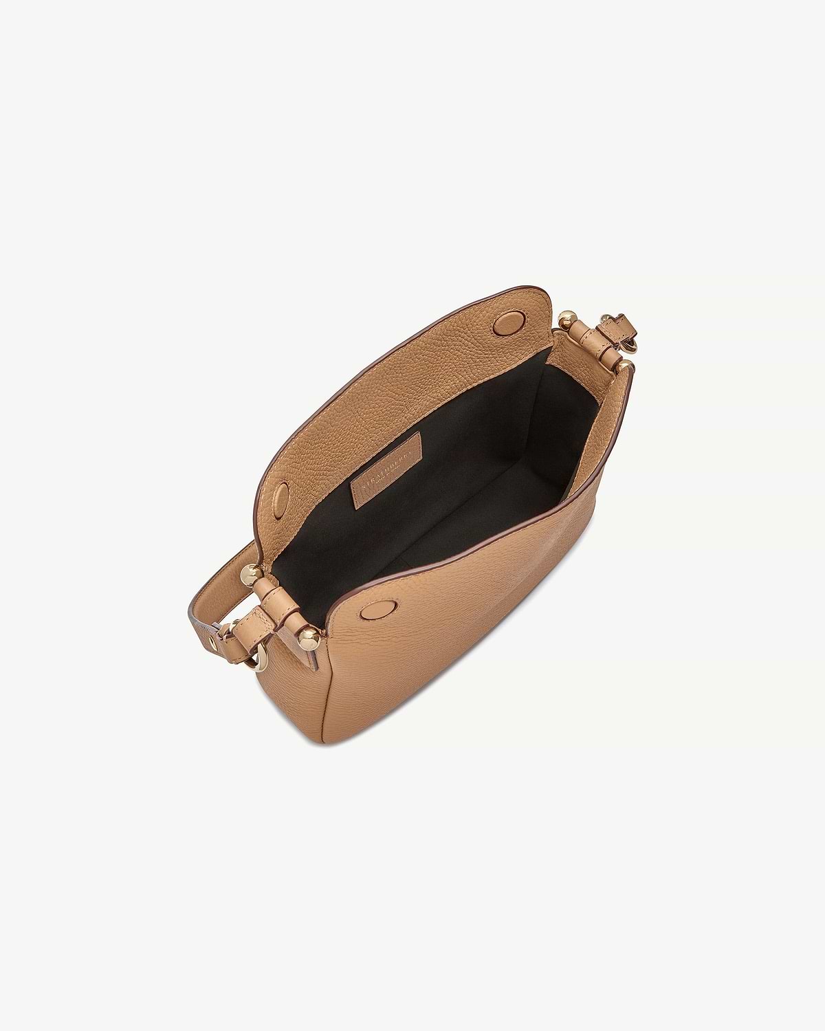 Top view of caramel Sway bag showing black lining and gold hardware.
