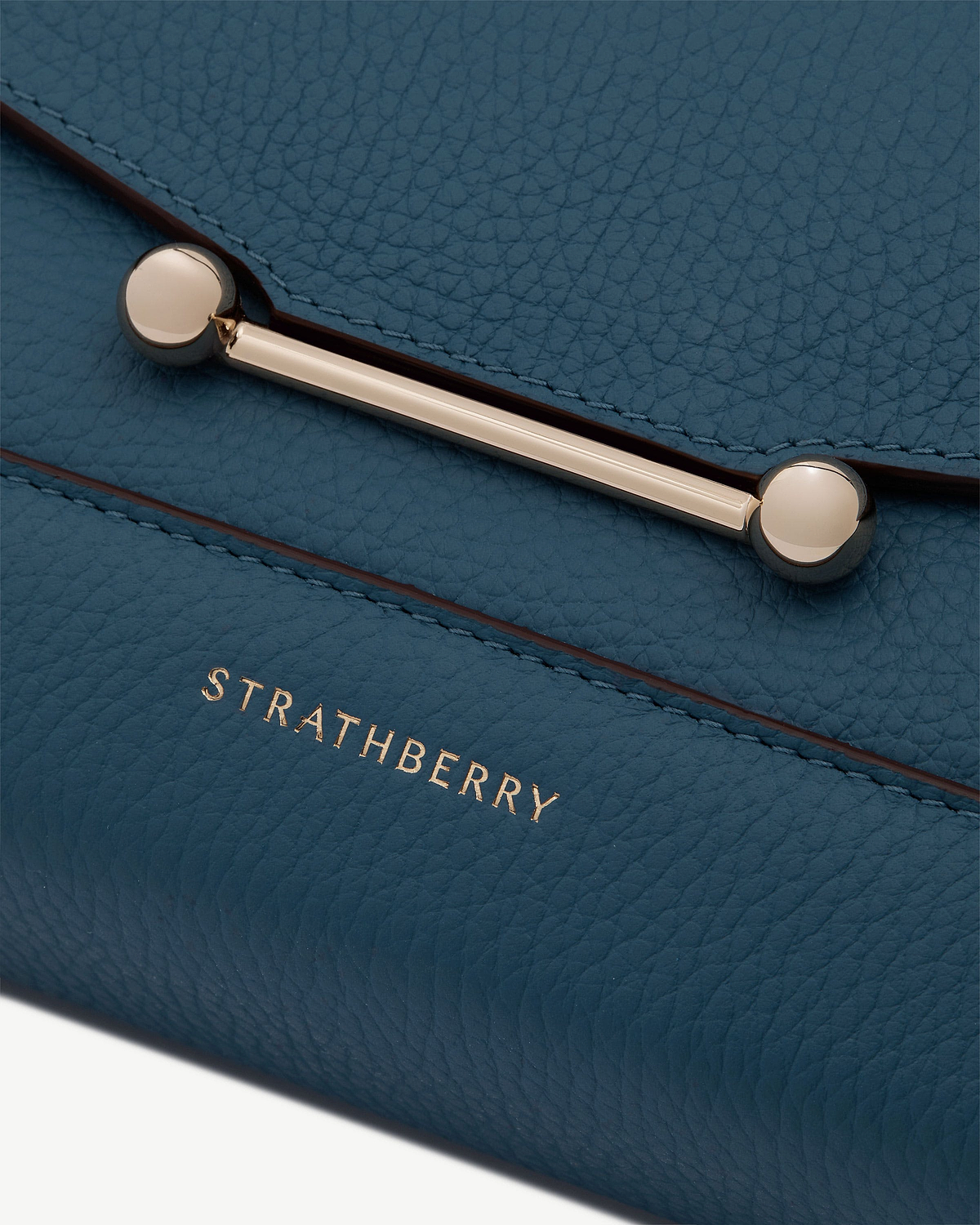 Loch blue Mosaic Shoulder pebbled leather with gold bar closure and Strathberry logo
