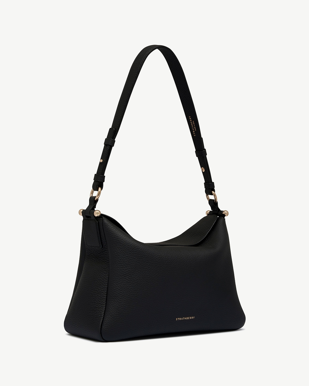 Black leather shoulder bag with gold hardware and Strathberry logo.