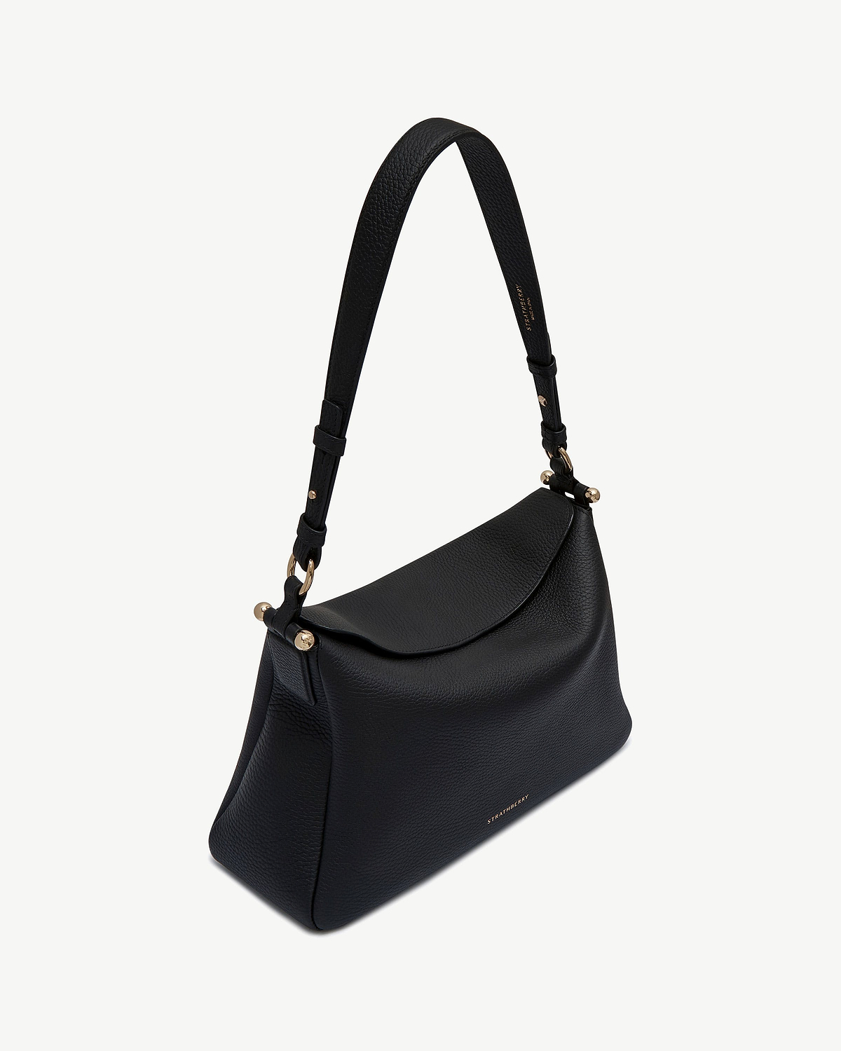 Black Strathberry Sway Maxi shoulder bag with pebbled leather and gold hardware.