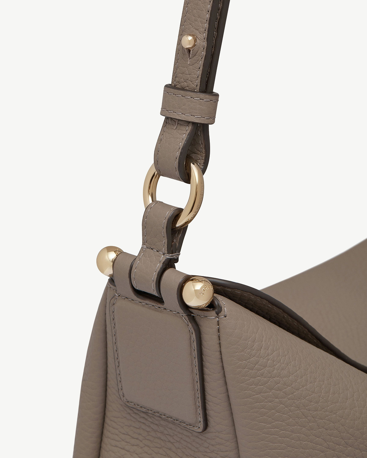 Taupe Sway Maxi leather strap with gold ring and stud hardware.