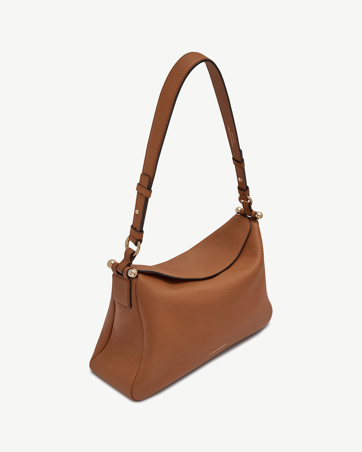 Tan Strathberry Sway Maxi leather shoulder bag with curved flap and gold hardware