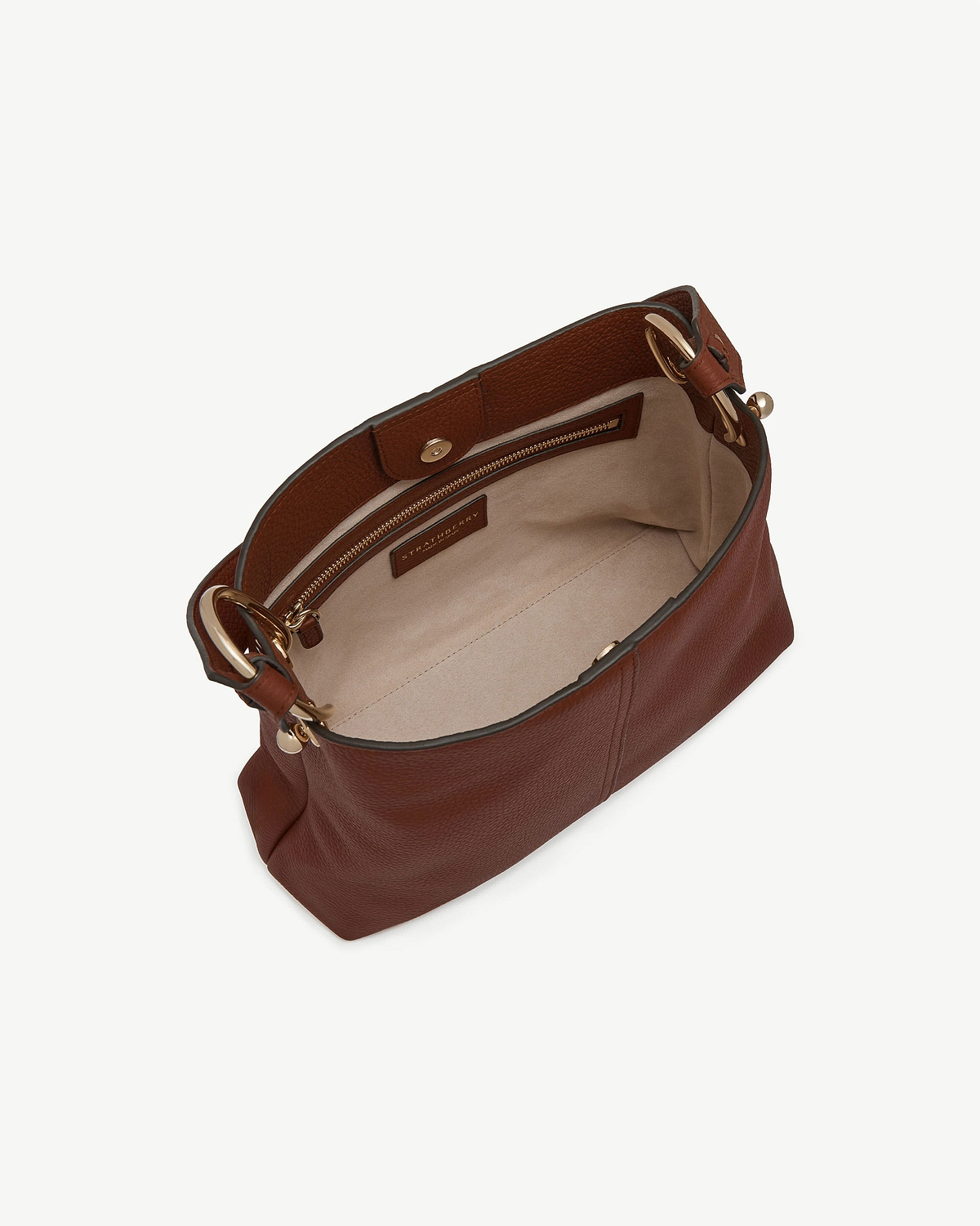 Walnut Lana Hobo bag interior with zip pocket, gold rings and Strathberry label.