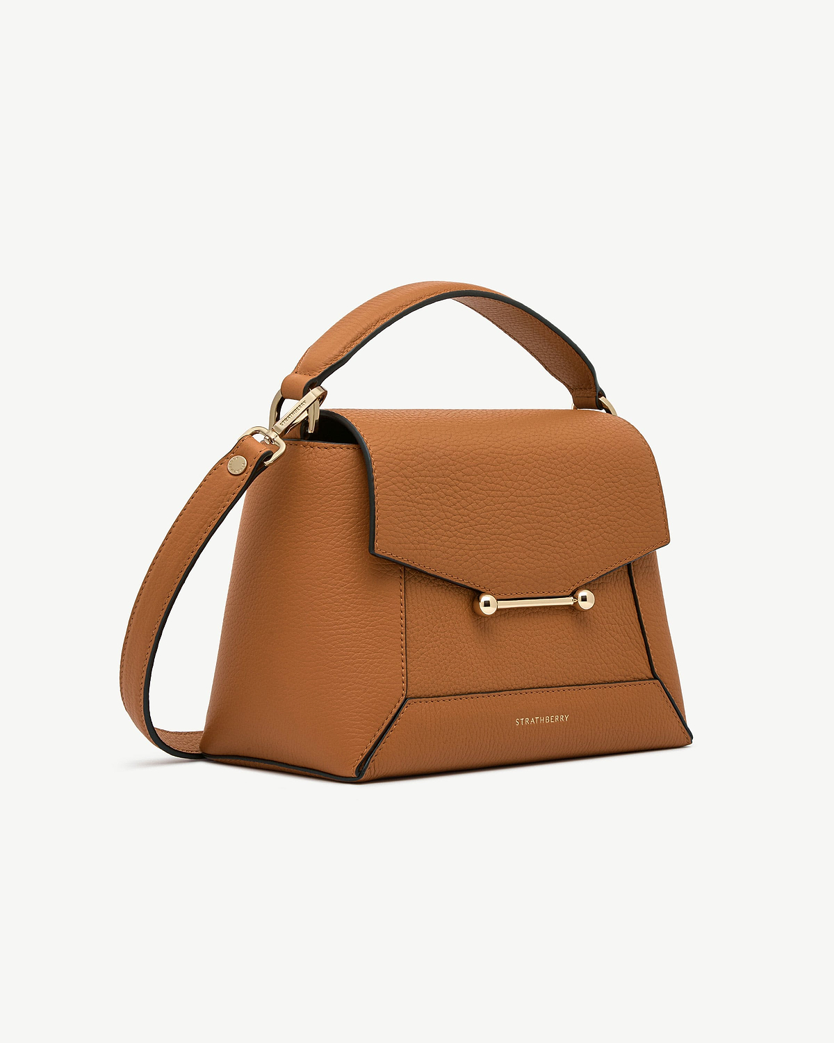 Honey pebbled leather mosaic bag with top handle, gold bar and Strathberry logo.