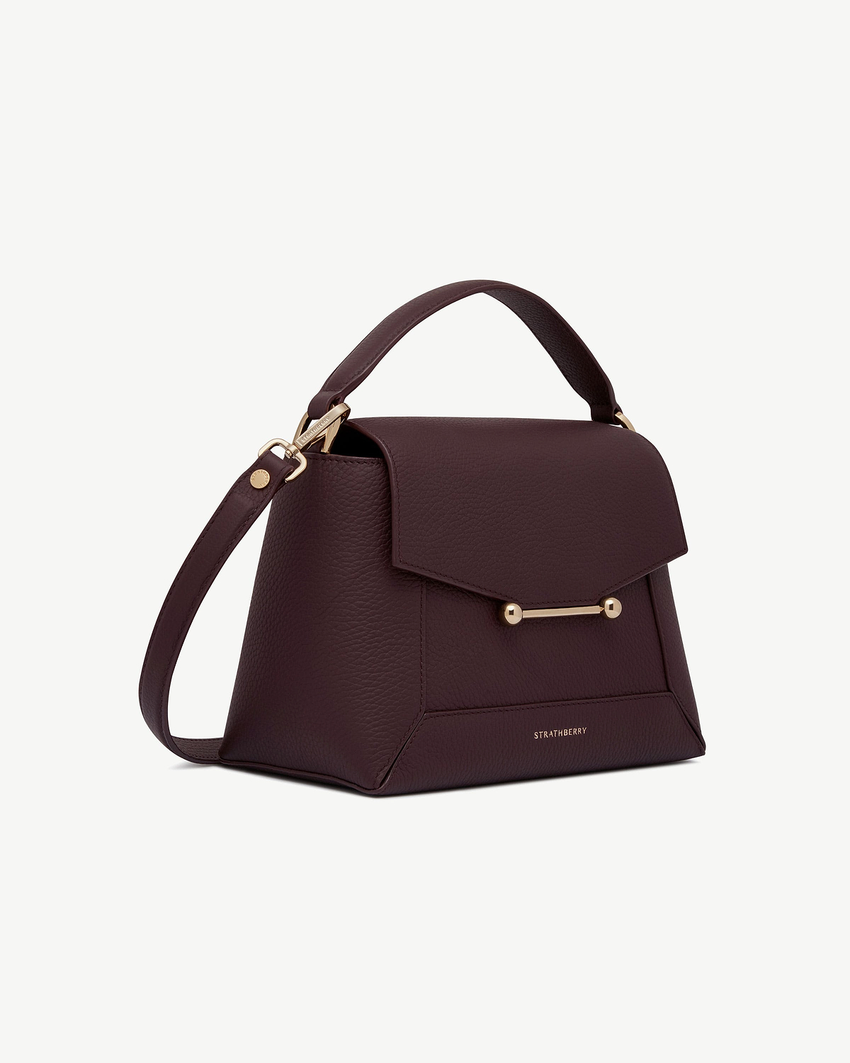 Burgundy Strathberry mosaic bag with top handle and gold bar fastening.