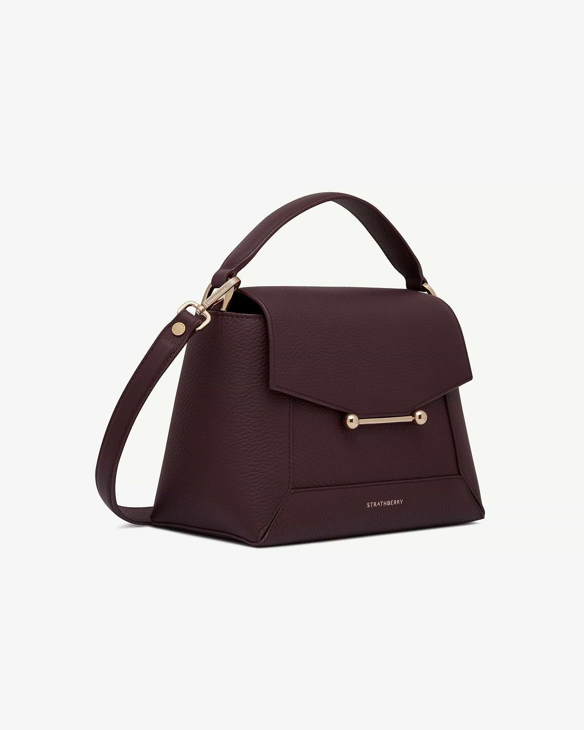 Burgundy Strathberry mosaic bag with top handle and gold bar fastening.