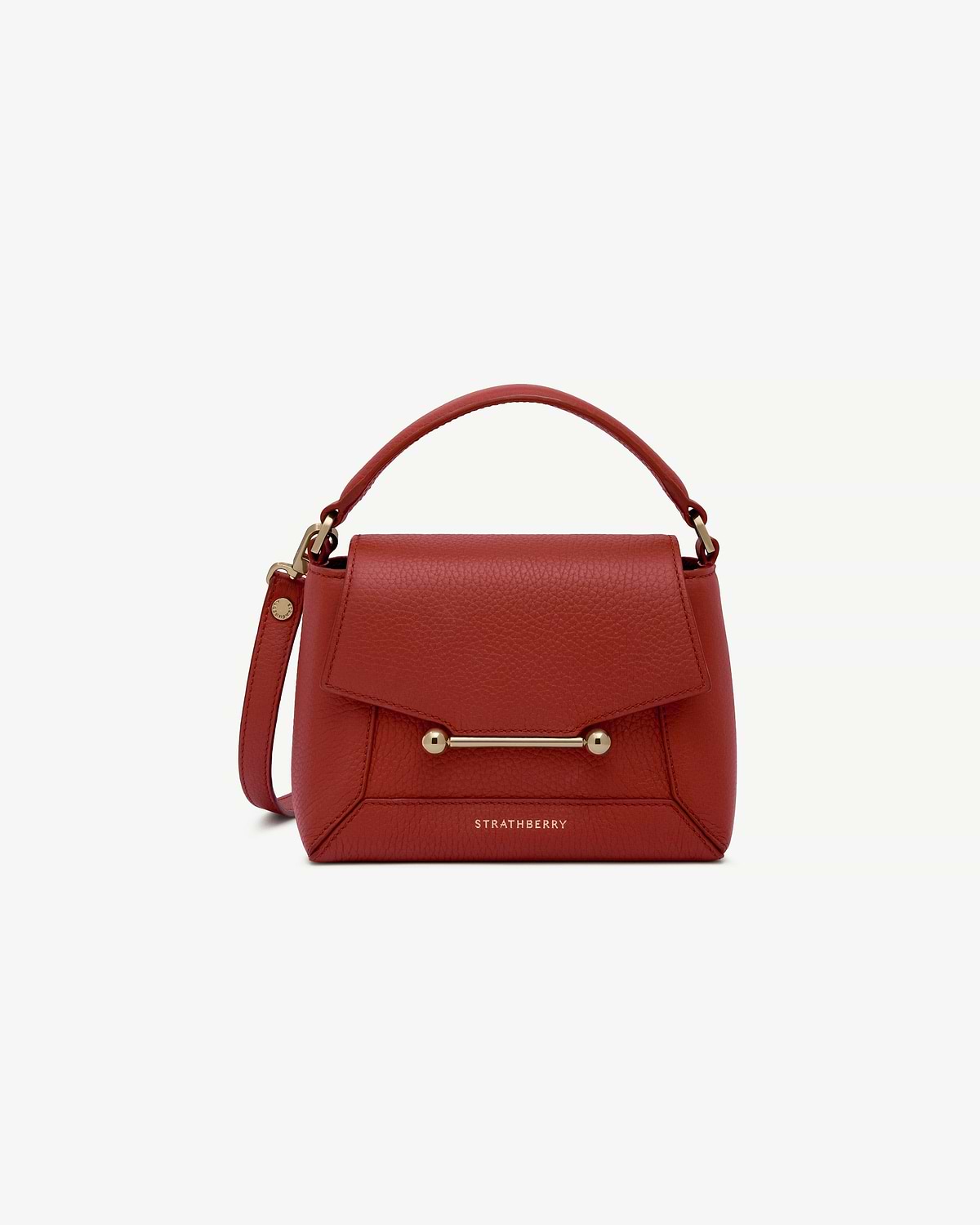 Strathberry leather bag in Levanto red with top handle and gold bar detail.