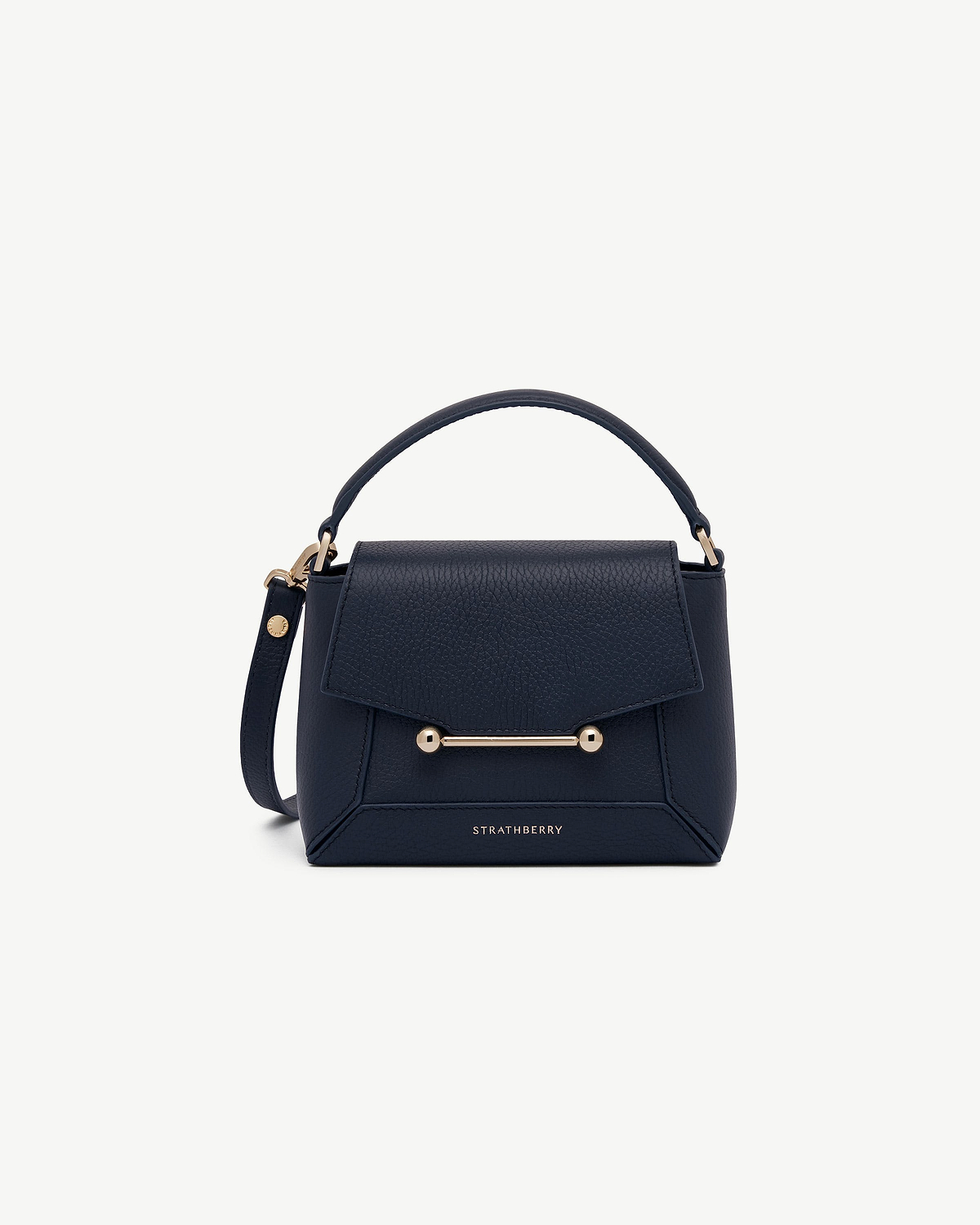 Navy Mosaic Nano top-handle bag with gold bar hardware and Strathberry logo