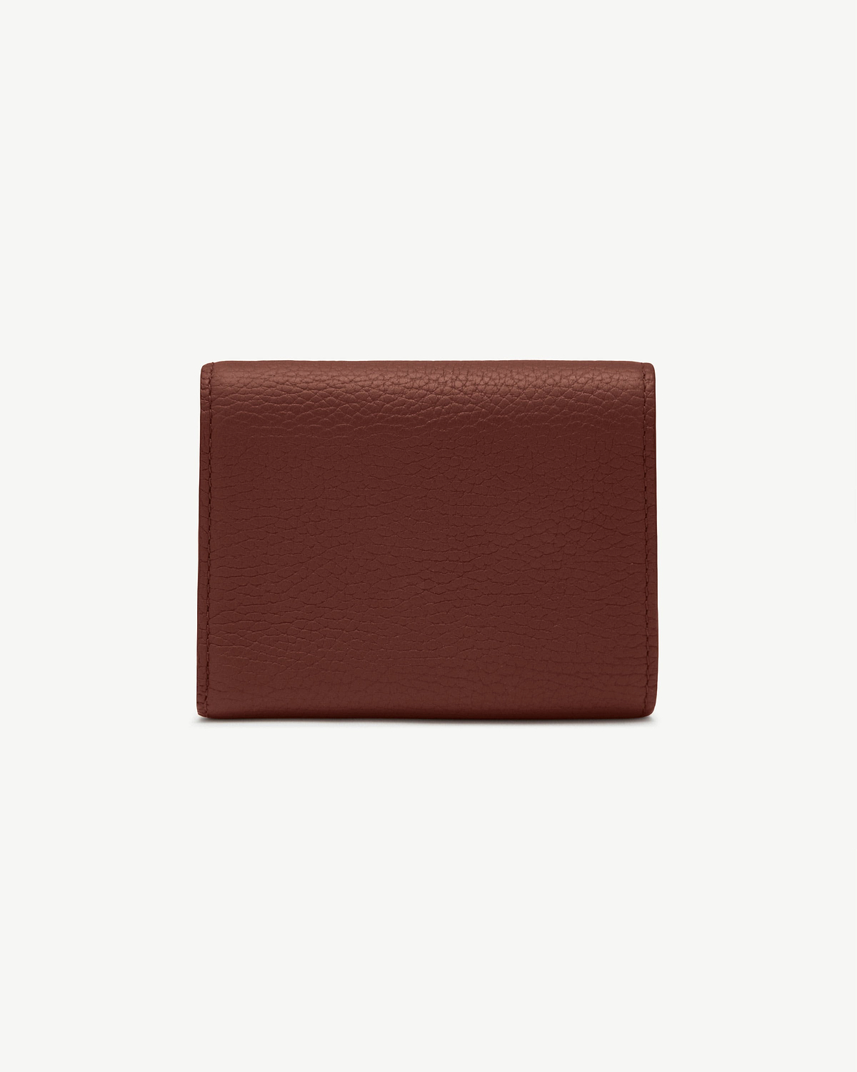Top edge of walnut mosaic trifold wallet in textured leather