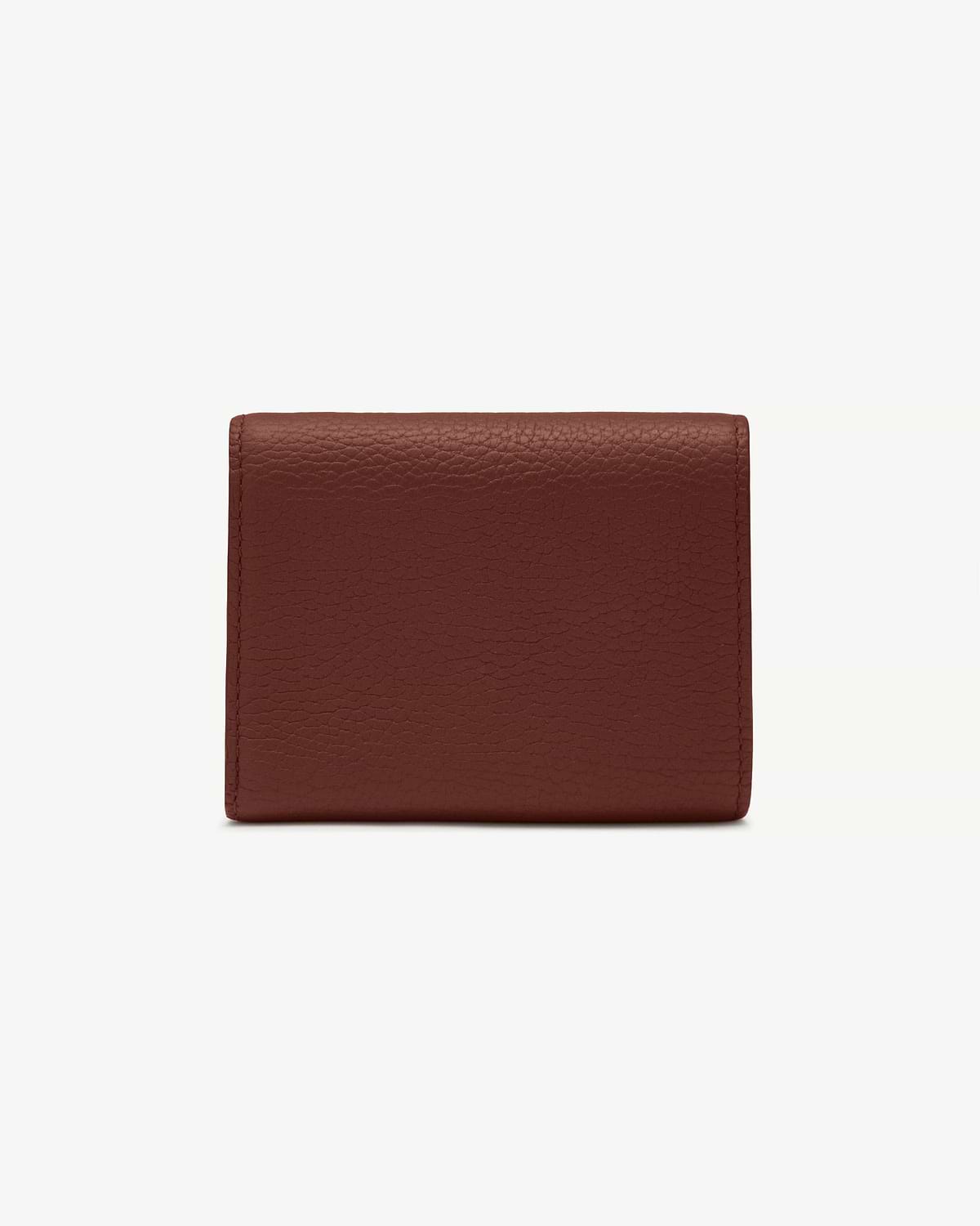 Top edge of walnut mosaic trifold wallet in textured leather