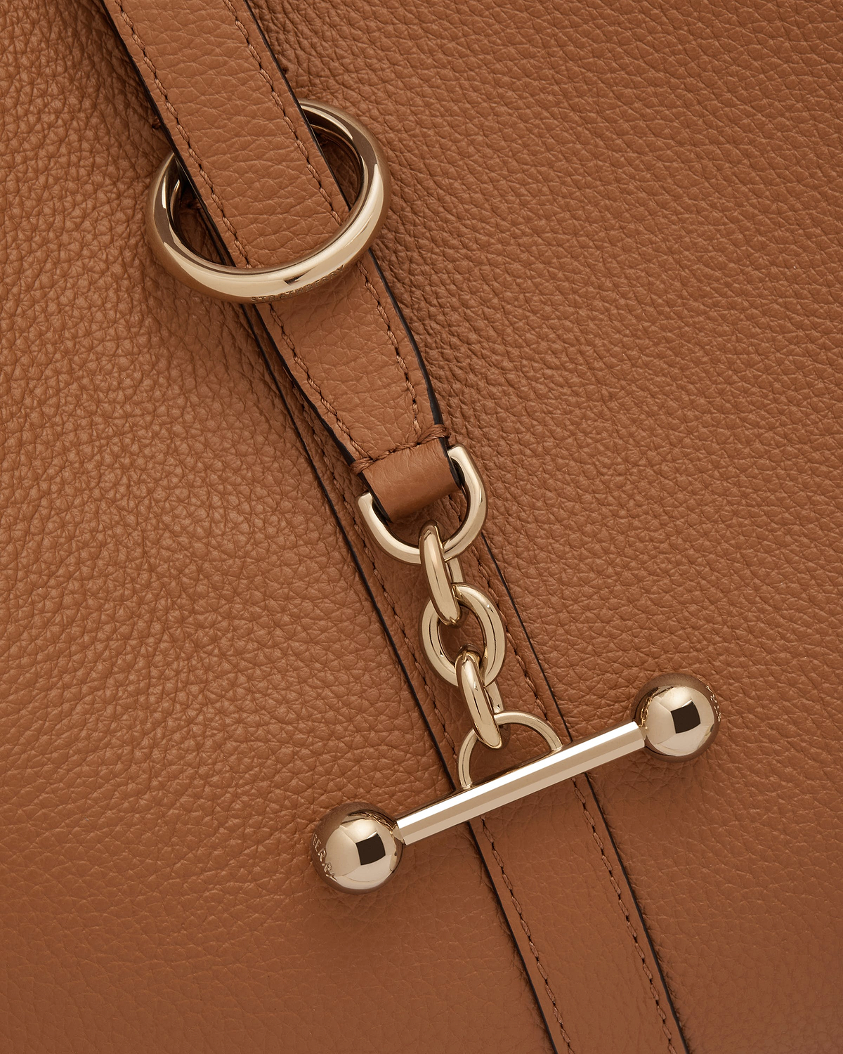 Tan pebbled leather bag strap with gold chain and bar clasp