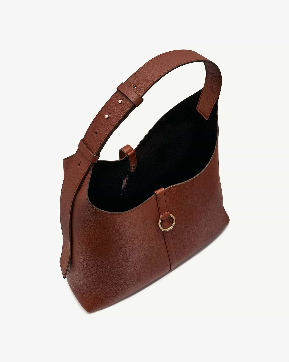 Walnut leather hobo bag with wide adjustable strap and gold ring detail.