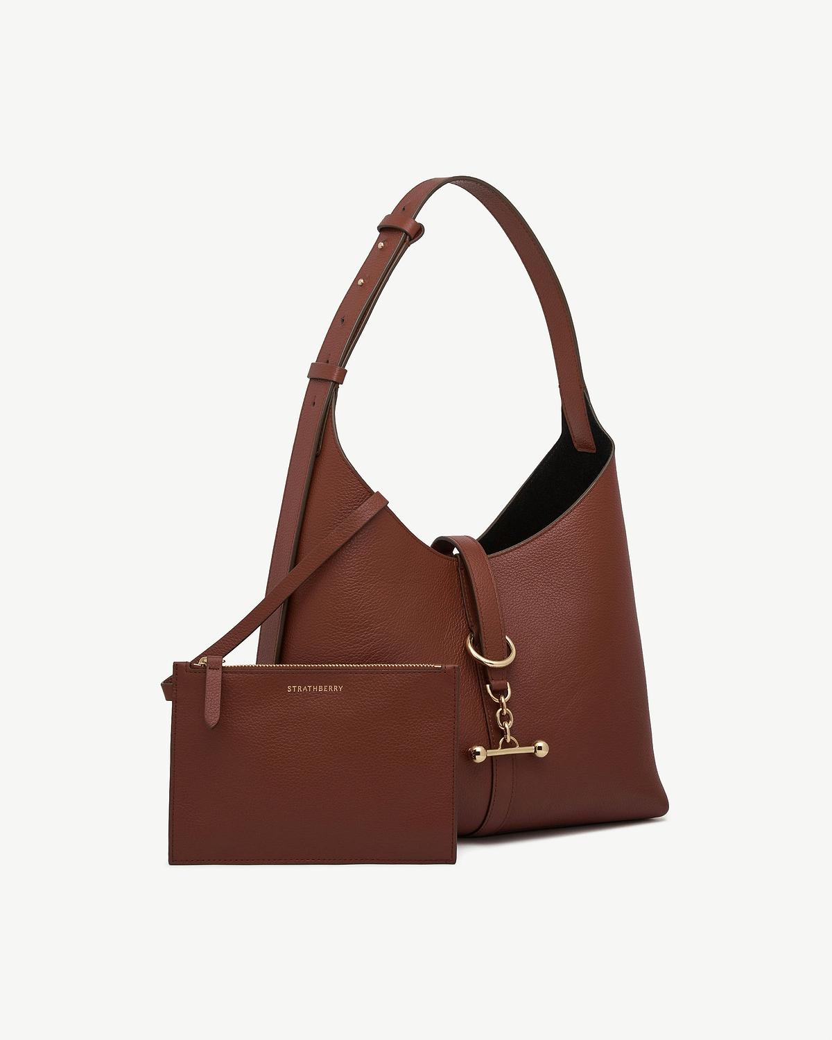 Walnut kite hobo bag with matching pouch, gold hardware, visible Strathberry logo.