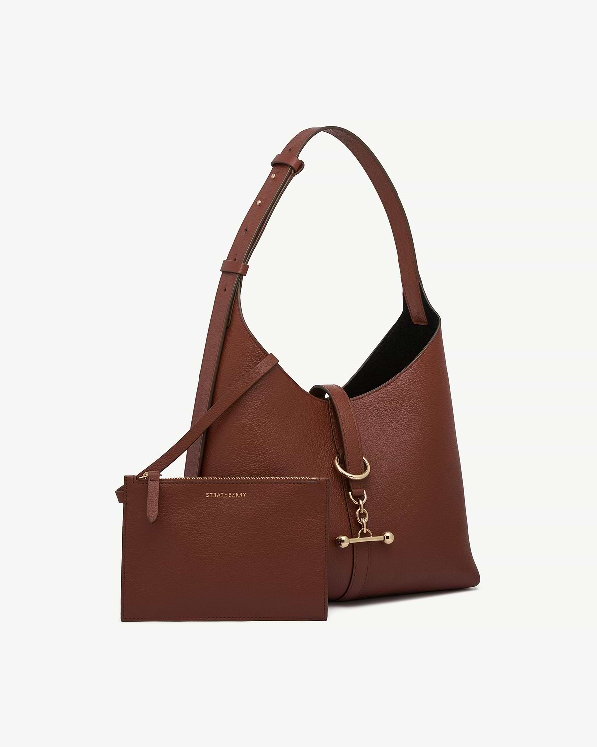 Walnut kite hobo bag with matching pouch, gold hardware, visible Strathberry logo.