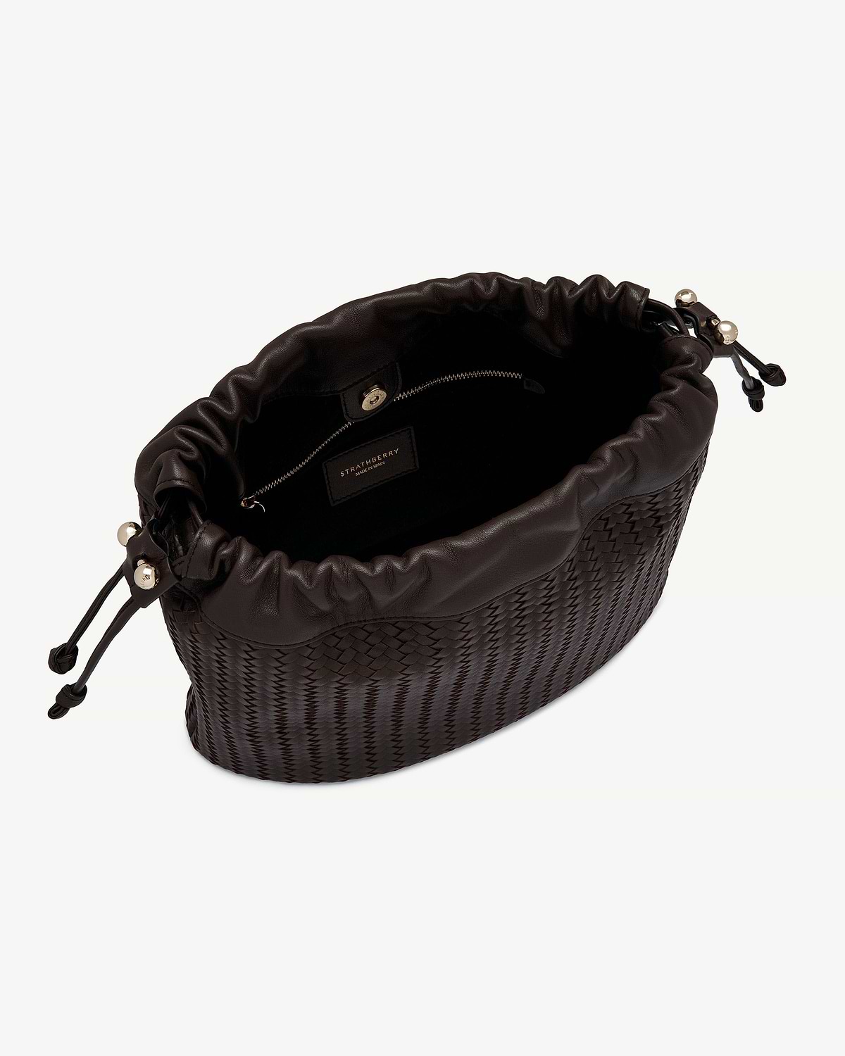 Strathberry Charlotte Midi drawstring bag in chocolate woven leather, open top view.