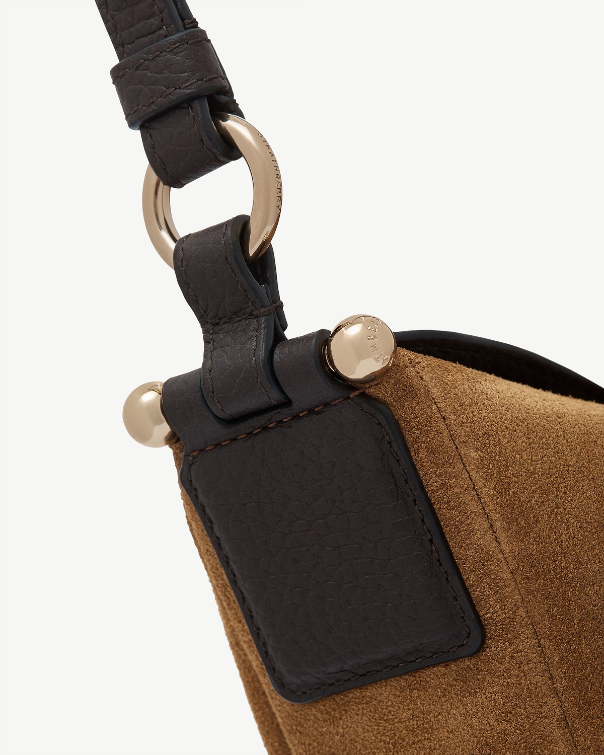 Toffee suede bag with espresso leather strap and Strathberry-engraved gold fittings.