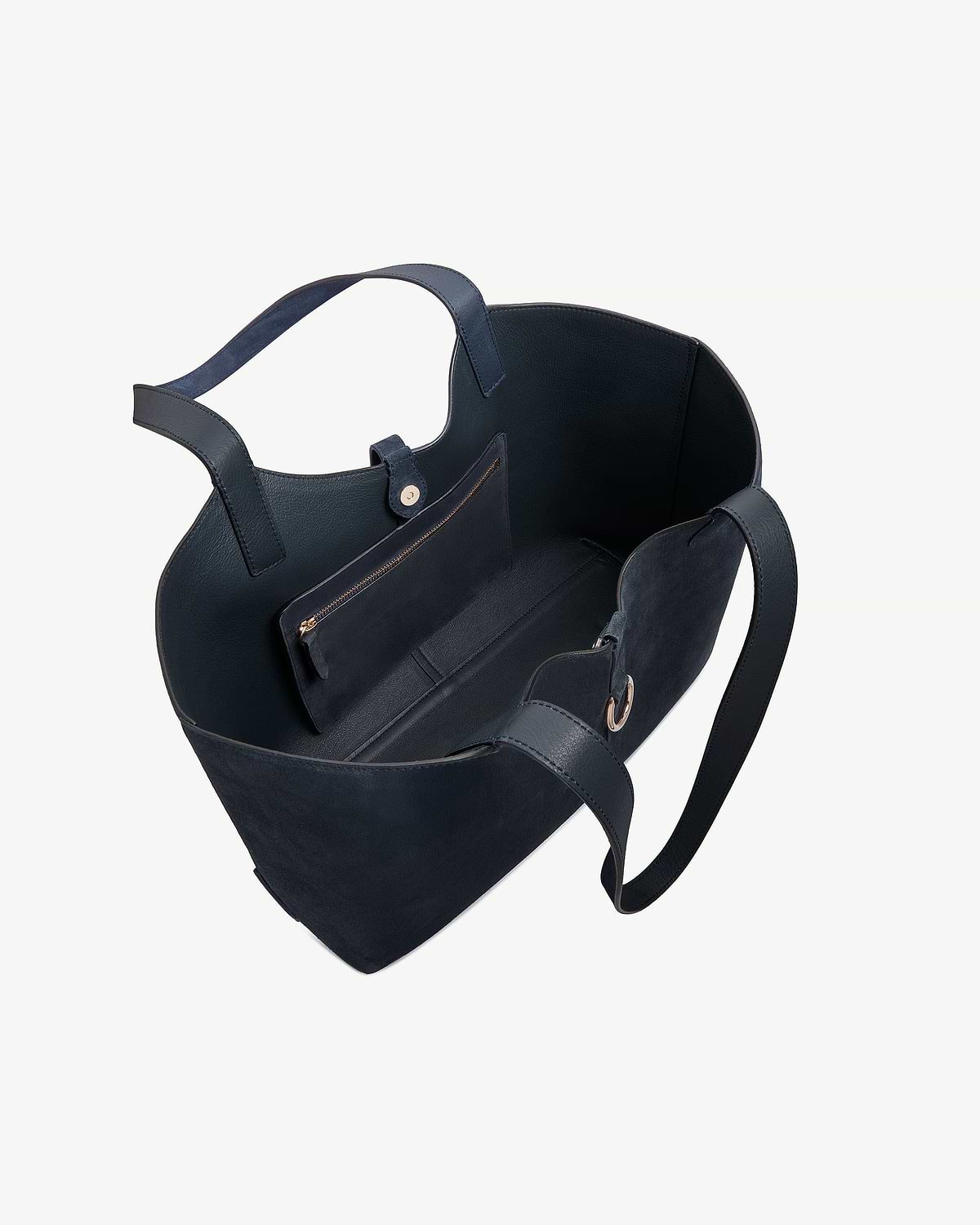 Navy suede Kite tote with open top, interior zip pocket and straps.