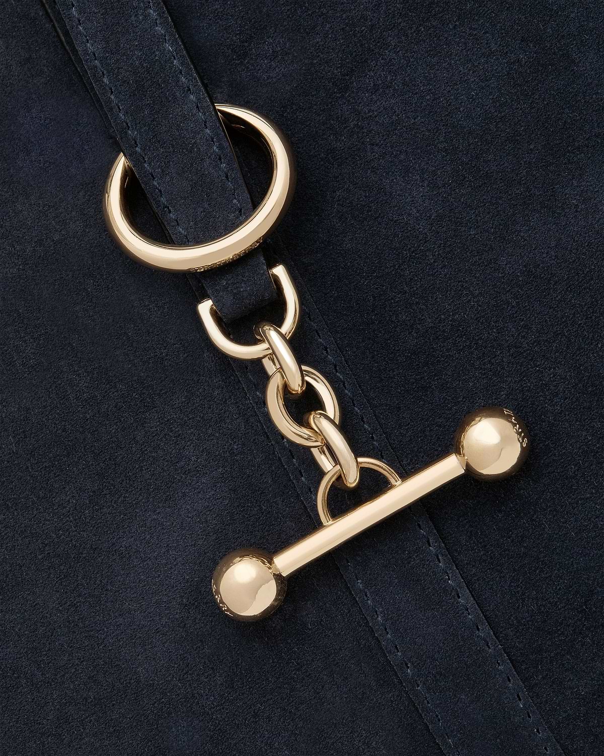 Navy suede kite tote with gold ring, chain and T-bar hardware.