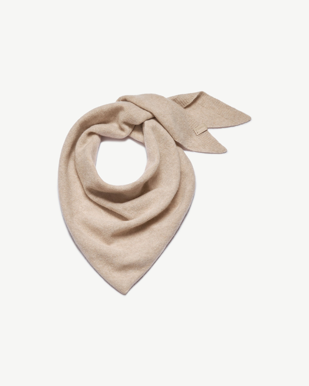 Oat-coloured cashmere bandana folded into a loop with pointed ends visible.