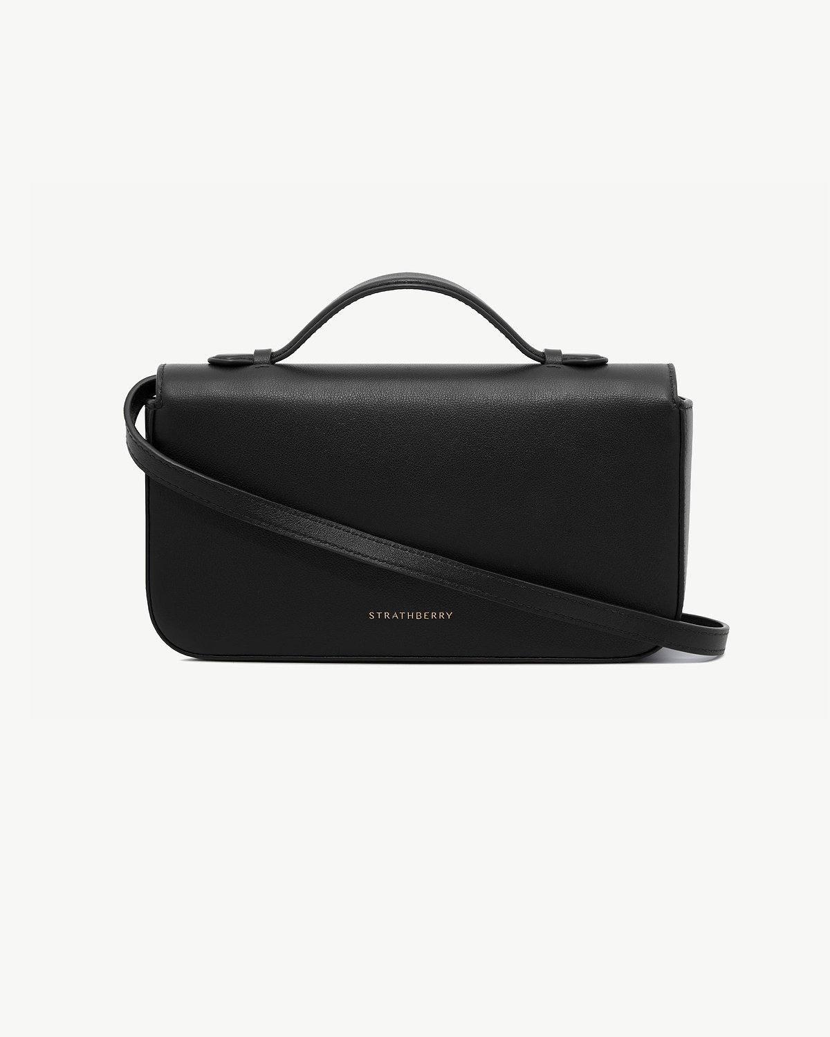 Black Nocturn clutch with top handle and crossbody strap, Strathberry logo.