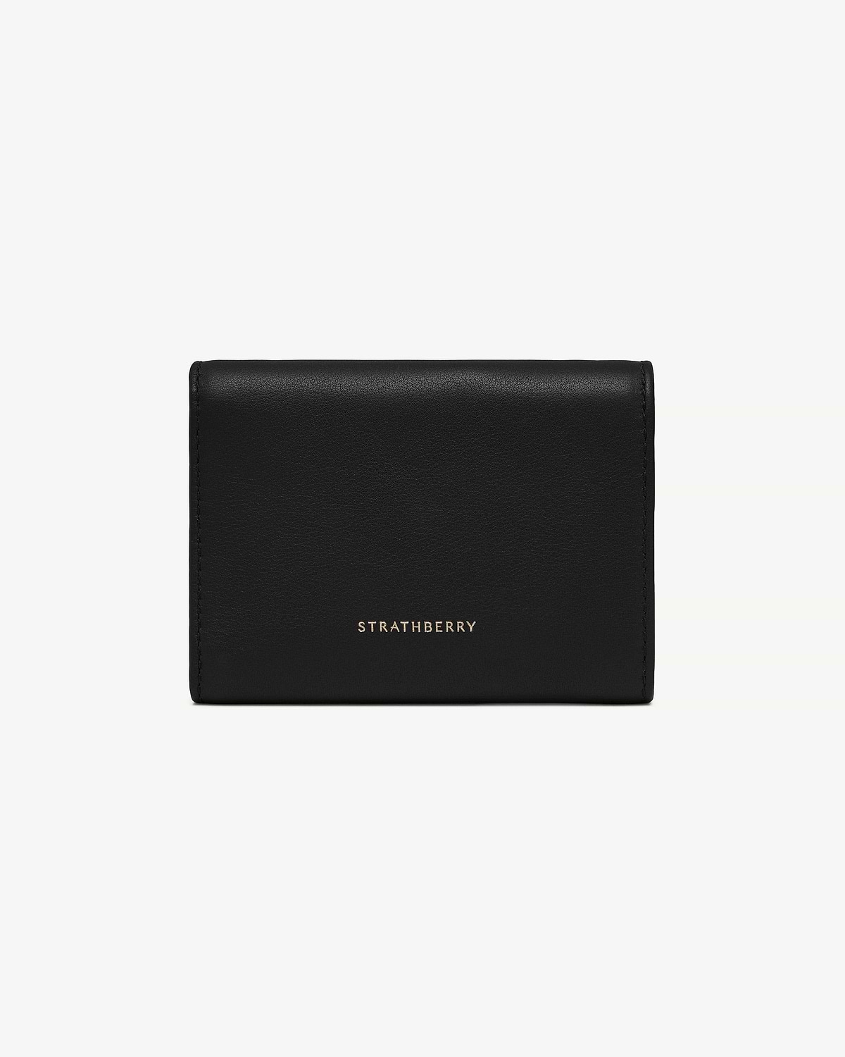 Black trifold leather wallet with Strathberry gold logo, vertical view.