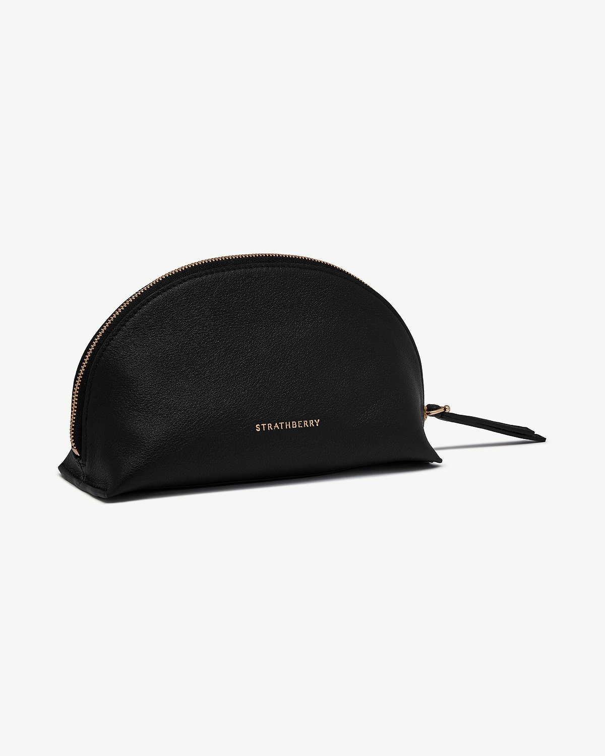 Black semi-circular leather pouch with gold Strathberry logo and zip pull.