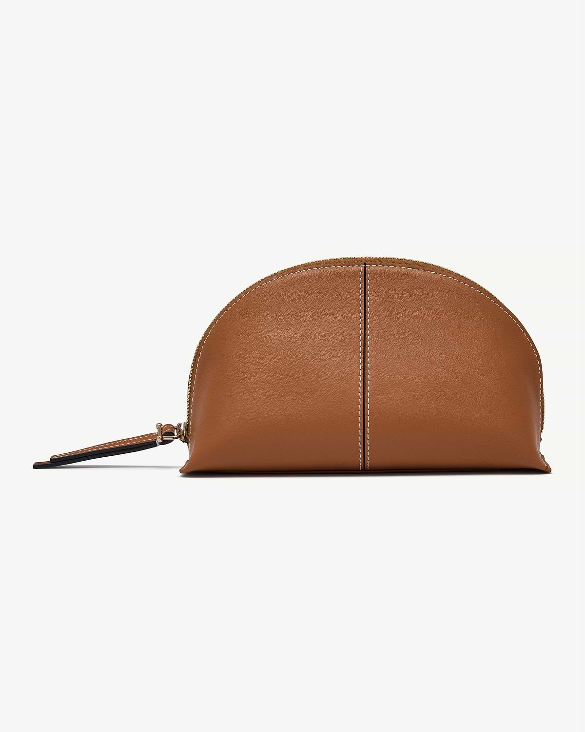Tan leather Nest pouch with central seam, white topstitching, zip and wrist strap.
