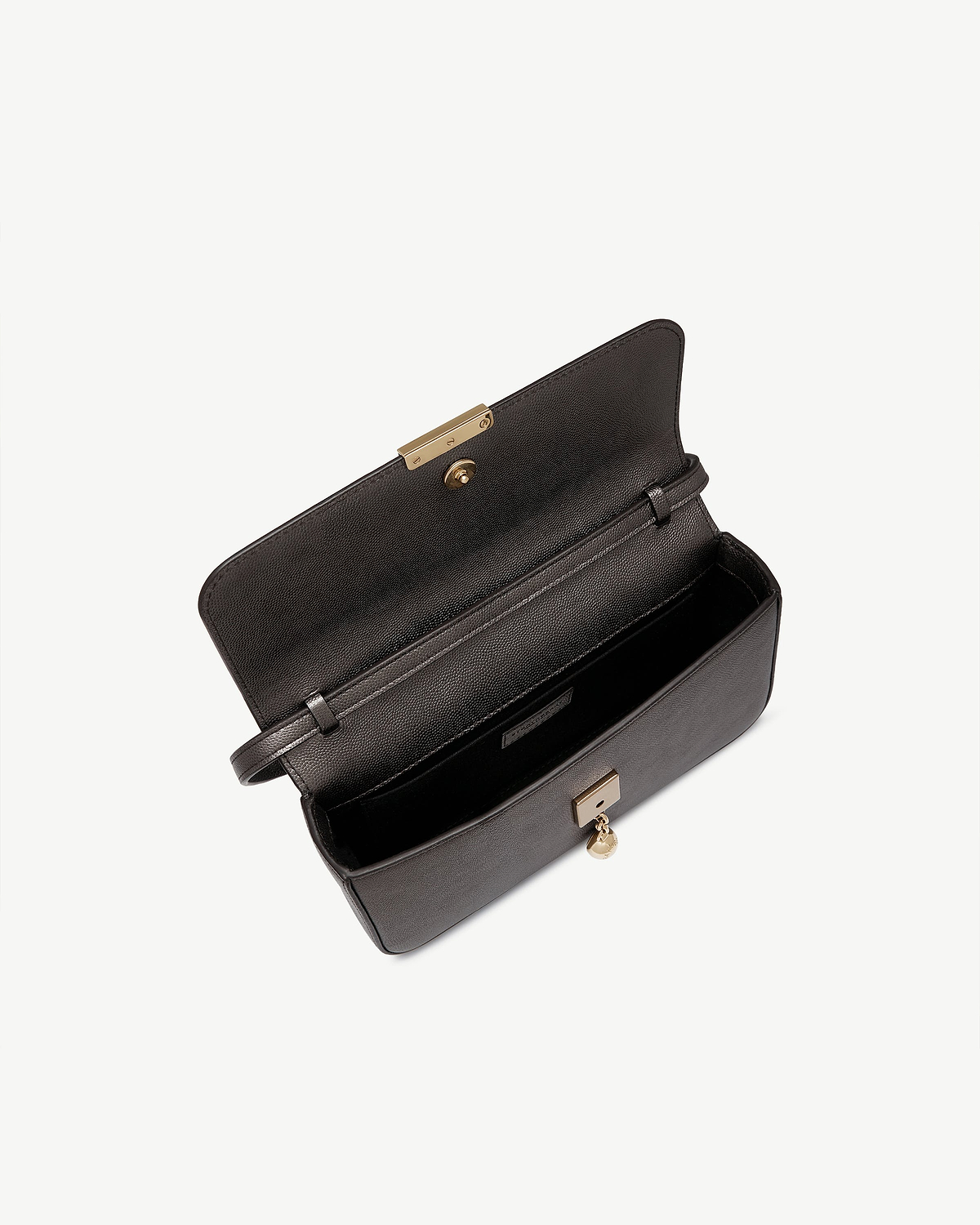 Open metallic anthracite caviar leather clutch with gold clasp and interior pocket.