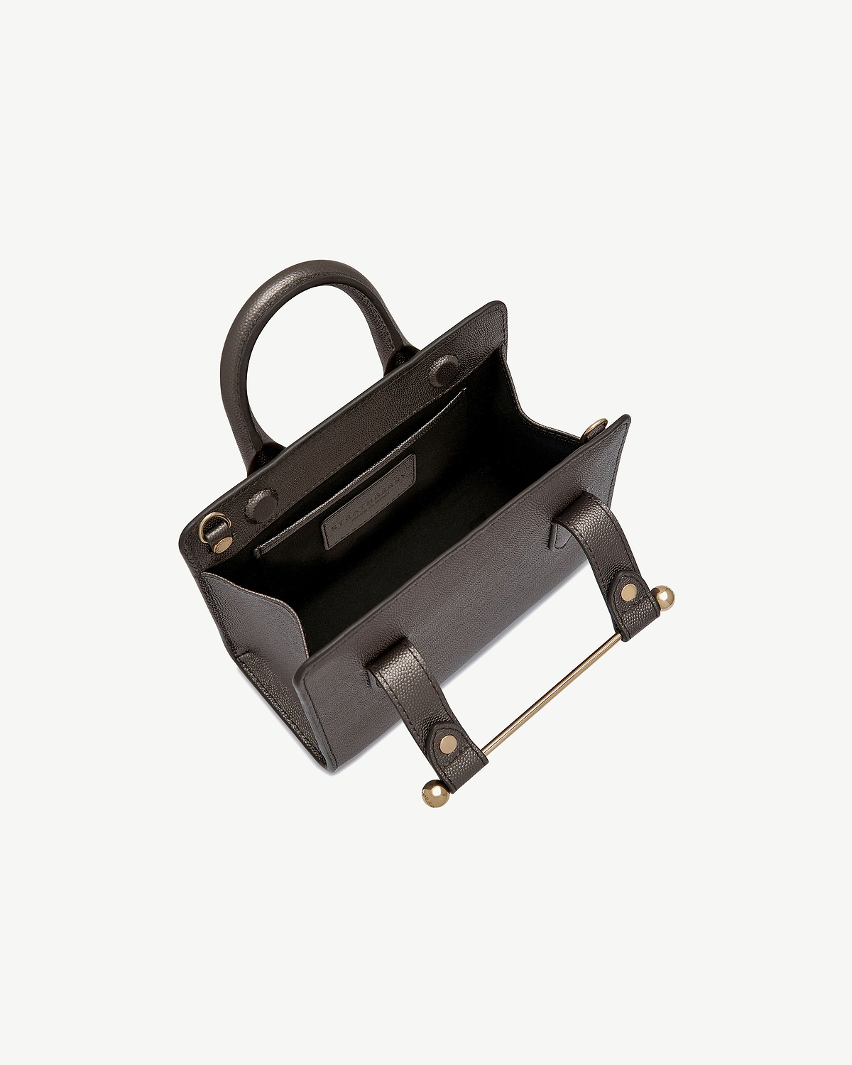 Open nano tote in metallic anthracite caviar with gold bar hardware, showing handles and interior