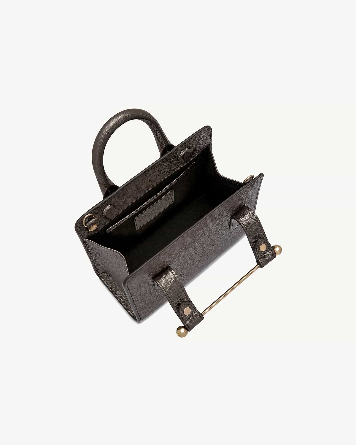 Open nano tote in metallic anthracite caviar with gold bar hardware, showing handles and interior