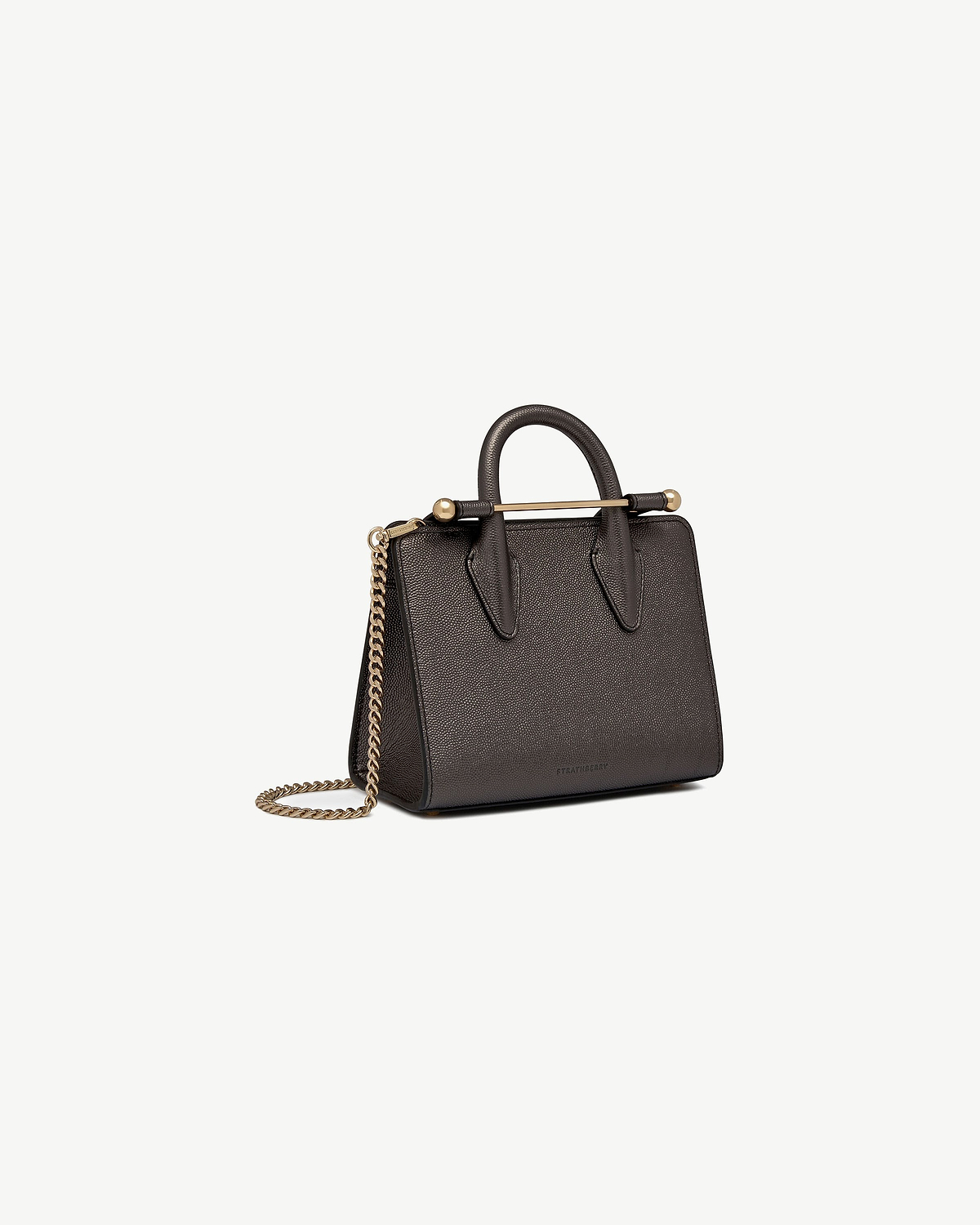 Strathberry nano tote in metallic anthracite caviar with top handles and gold chain strap