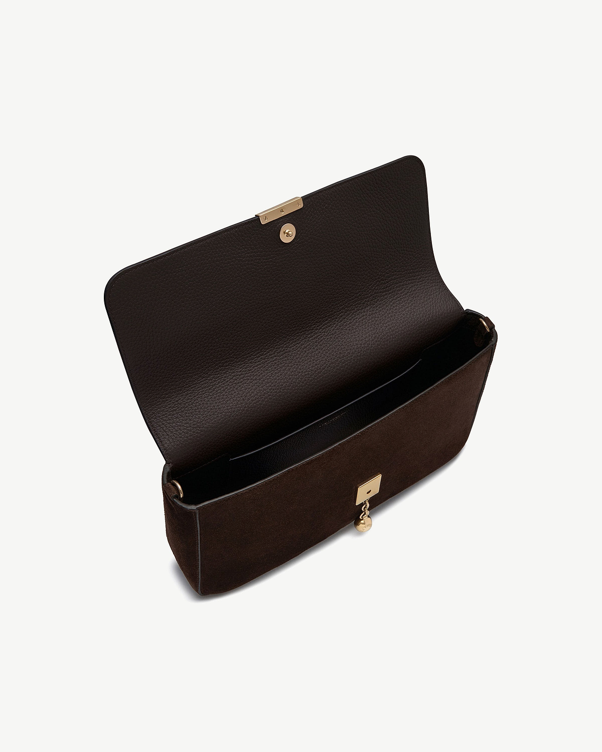 Espresso suede bag with open flap, pebbled leather interior and gold clasp