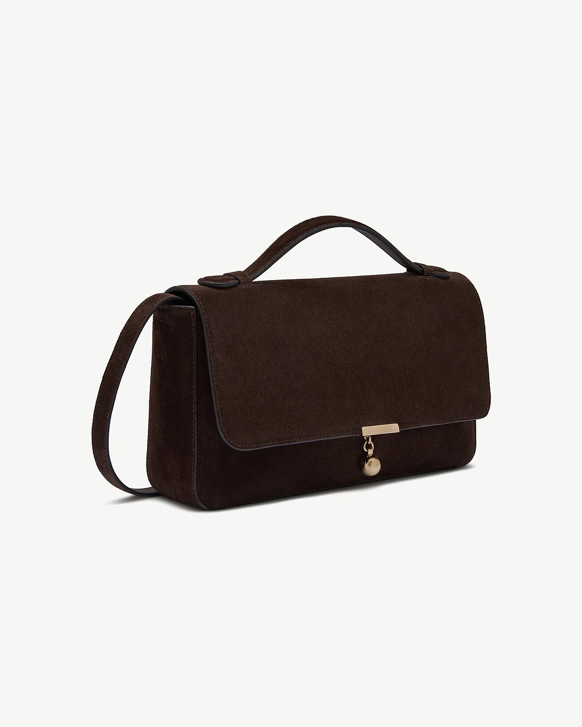 Espresso suede flap bag with top handle, shoulder strap and gold charm.