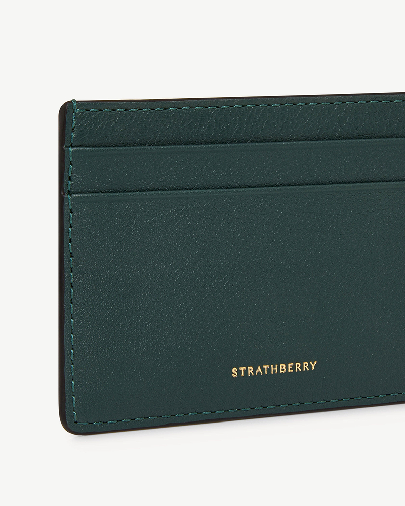 Bottle green leather cardholder corner with card slots and gold Strathberry logo