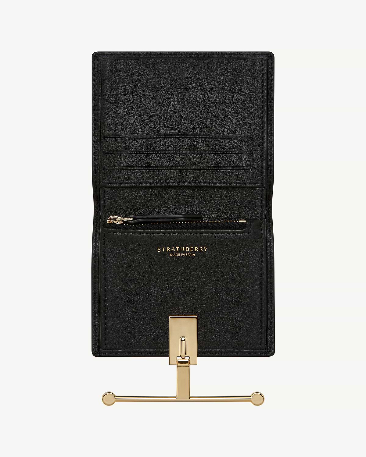 Black Strathberry Melville Street wallet open showing card slots and gold hardware.